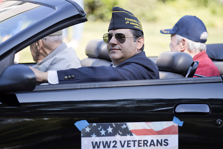 Lt. Colonel Paul C. Dulchinos, Sr. (US Army Retired) along with other veterans, participates in a previous year's Barrington's Memorial Day Parade.