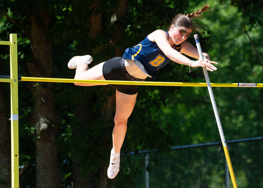 Barrington High School’s Ellie Noonan, shown soaring to a first place finish in the pole vault at last year's state track championship, won the pole vault event at the Classical Classic Track and Field meet at Conley Stadium in Providence last weekend.