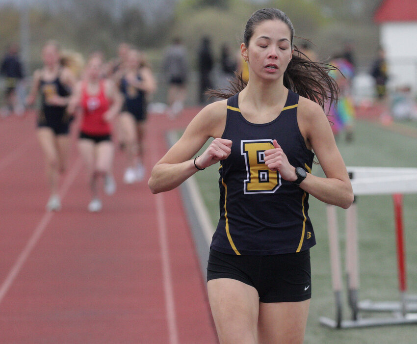 Barrington High School's Sara Chang runs to a second-place finish in the 1,500-meter race during a meet at Portsmouth High School on Monday, April 21.