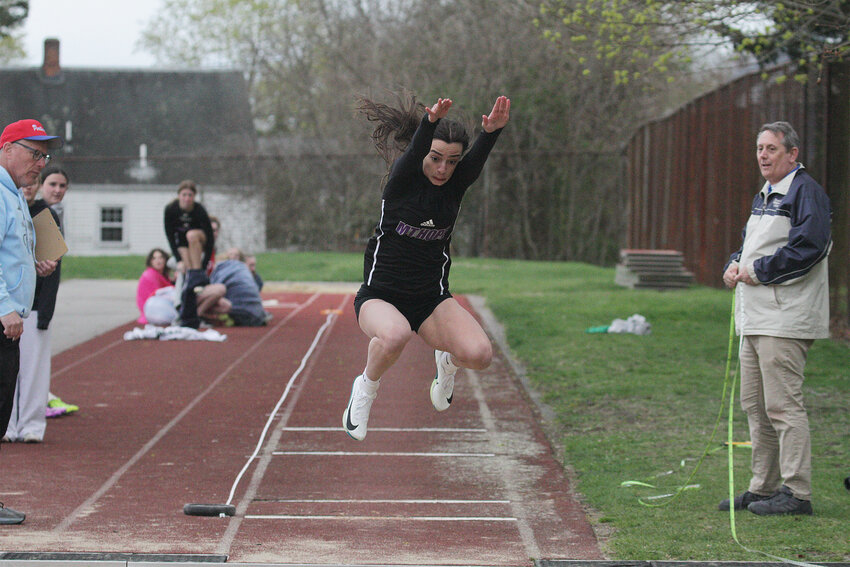 Mt. Hope High star Thea Jackson competes in the long jump for the Huskies in their 2025 season-opening meet in Portsmouth. The junior broke her own school record in winning the event.