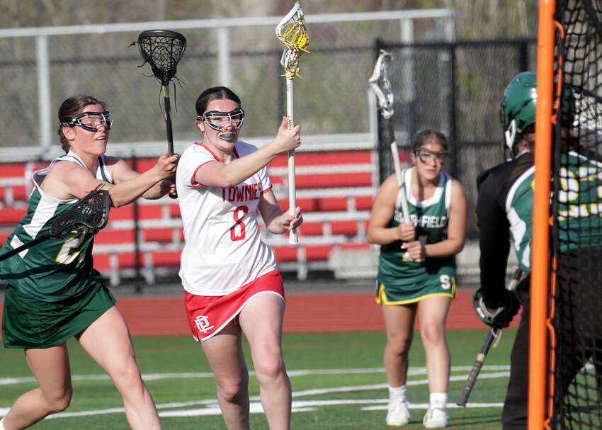 Alyssa Karalekas looks to shoot during the Townies 8-7 overtime win over Smithfield on Thursday. Karalekas scored 4 goals during the game and leads the team in scoring.