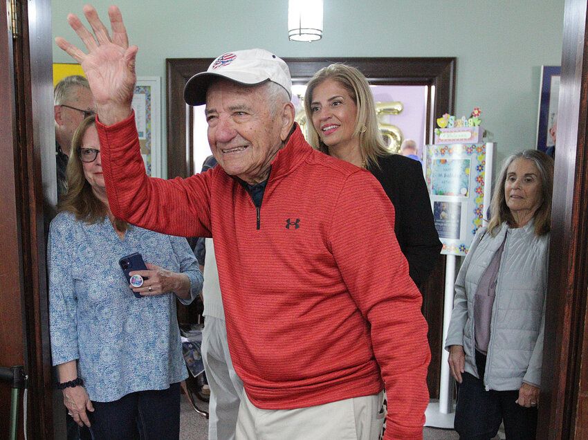 Arthur Medeiros greets admirers who gathered at the Bristol Senior Center to celebrate his 105th birthday.
