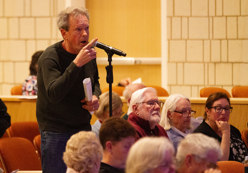 Former town moderator Stephen Fors speaks from the floor at Tuesday's Town Meeting.