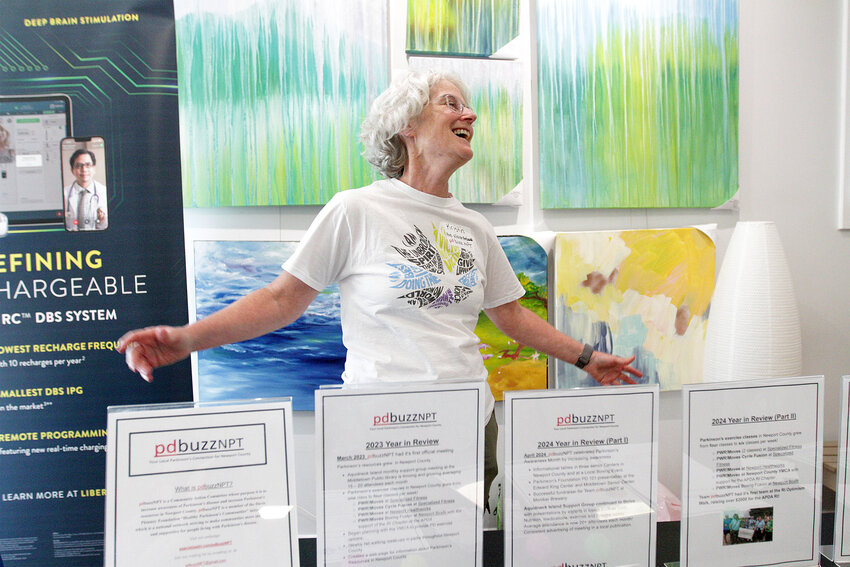 Kristin Matteson, a certified PWR!Moves specialist (a Parkinson’s-specific exercise program), shares a big smile as visitors of the Renew! Retreat engage with her about pdbuzzNPT — her initiative dedicated to bringing support, resources, and movement to people living with Parkinson’s in and around Rhode Island.
