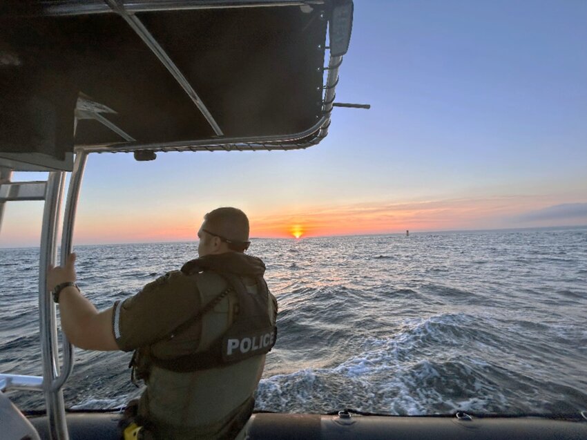 Rhode Island Environmental Police Officer Anthony Sullivan patrolling Rhode Island waters. May 17-23 is National Safe Boating Week.
