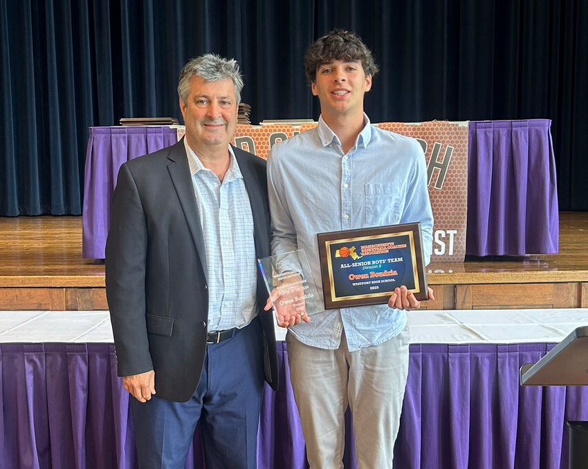 Westport basketball team head coach Scot Boudria (left) poses with his son and senior player, Owen Boudria after he was named Division 5 Player of the Year by the Massachusetts Basketball Coaches Association at the Red Auerbach Senior Awards Breakfast on Sunday.