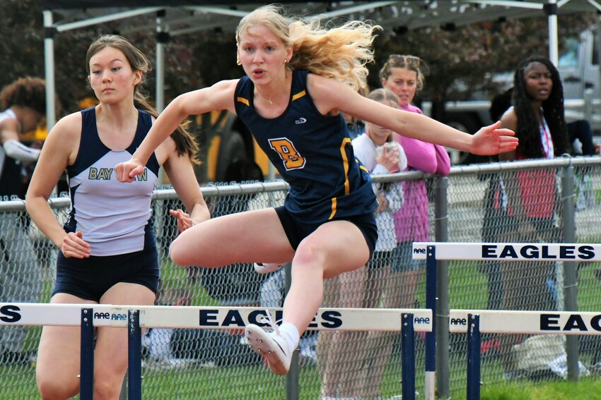 Barrington High School’s Charlie Dimery clears a hurdle while competing in the Eastern Division Championship on Sunday, May 18. Dimery finished second in the event.