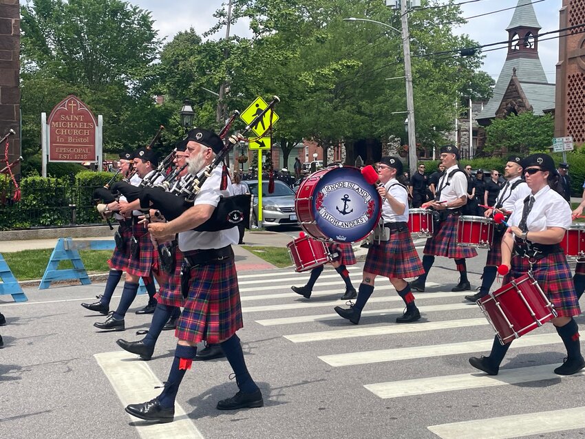 The procession marched to the sound of the Rhode Island Highlanders’ bagpipes.