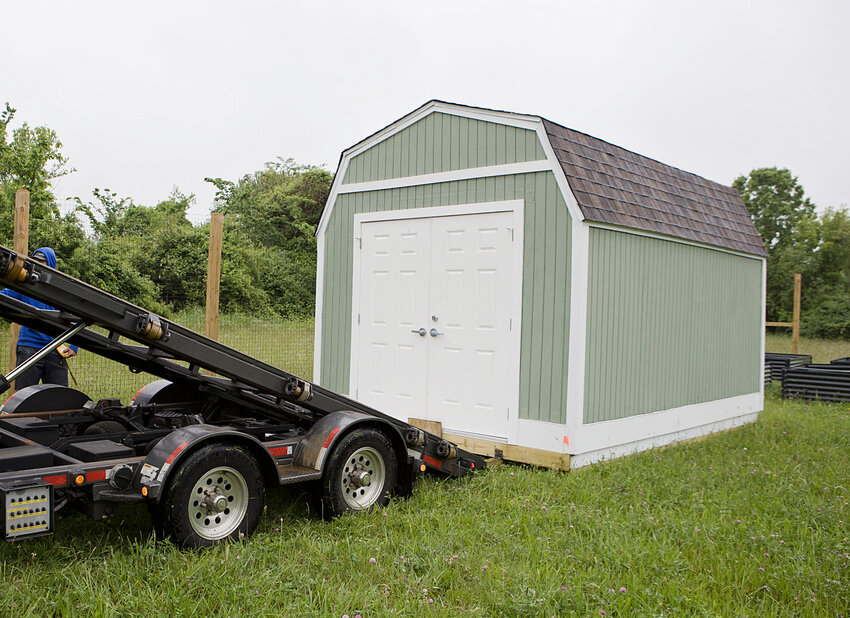 A refurbished shed, the work done by Mt. Hope High School Career and Tech Center students and which was once located at town beach, was recently situated at the new community garden site in Warren.