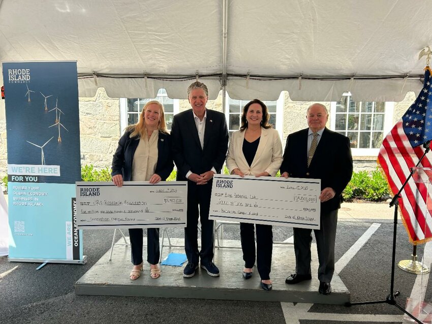 (l-r) Dr. Bethany Jenkins of URI, Governor Dan McKee, Commerce Secretary Liz Tanner, and Joseph M. Brito, Jr. of Unity Park.