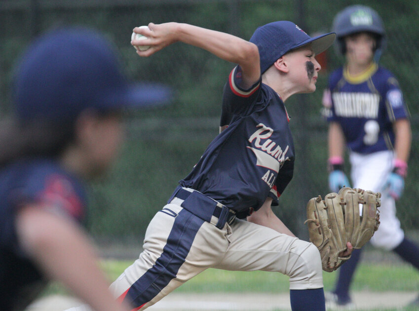Pitcher Donovan Bazar rears back to make a pitch in the bottom of the first inning during Rumford's 4-3 loss to Barington at Sherwood Field on Monday night.