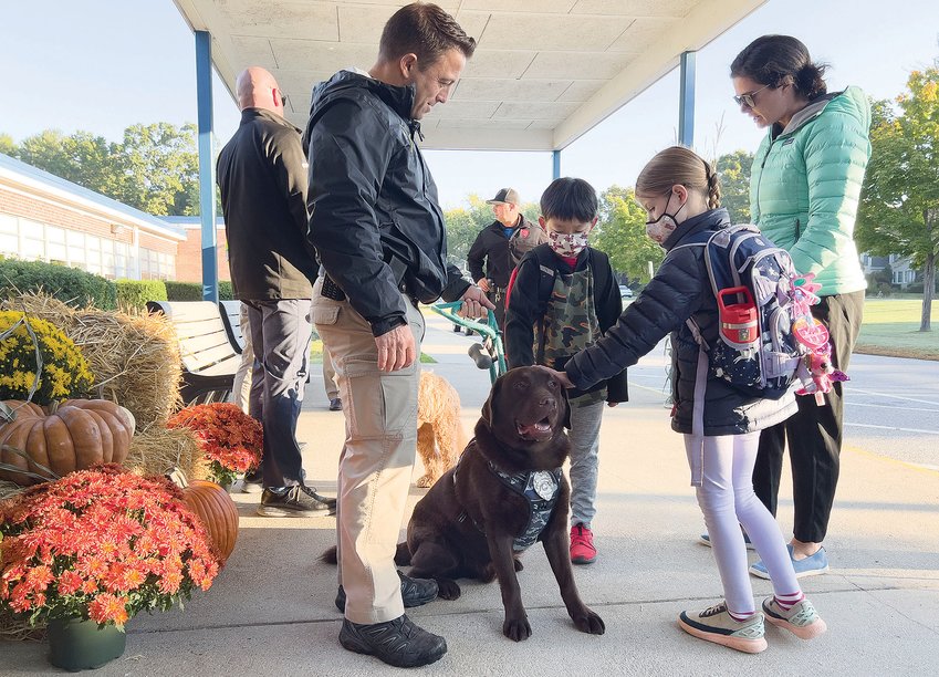 Bristol Police Officer Keith Medeiros, one of that town’s two school resource officers, recently brought K-9 officer Brody to Sowams Elementary School in Barrington to greet students in the morning.