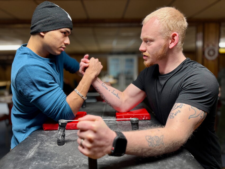 Harsh Shaw (left) squares up against Mike Costa during practice. Both men will be competing in the tournament next month.