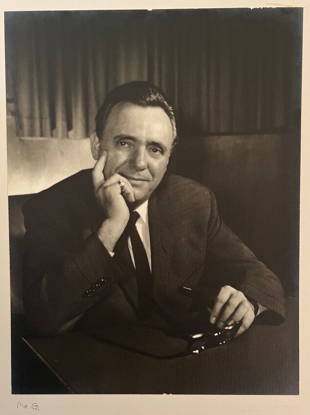 Can you help identify the mysterious and sharp-dressed "Mr. G"?