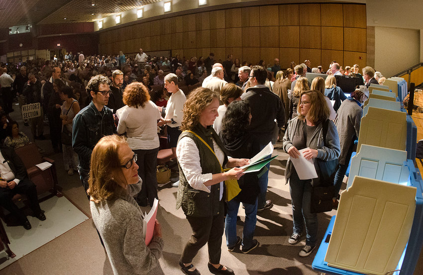 Barrington residents cast ballots during a previous year's financial town meeting.
