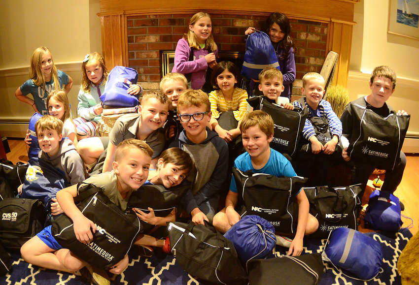 A group of Barrington children assembled care packs for homeless veterans recently. Barrington's Tinsley Kampmier-Williamson, who founded a charity called The Care Pack Project RI, organized the care pack assembly event.