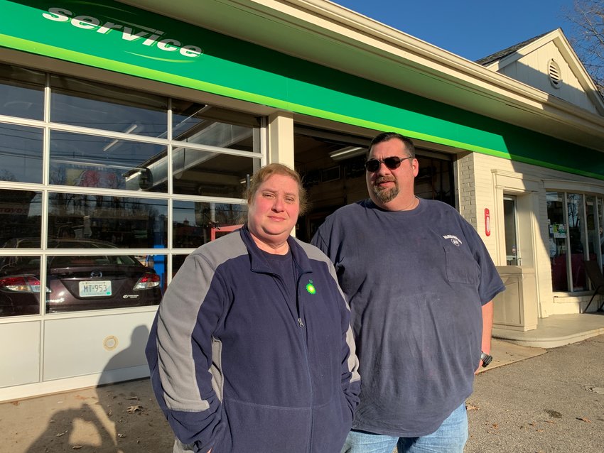 Wendy and Ken Wajda stand outside their BP gas station and repair shop on Thursday afternoon, Nov. 21. A day later, a plan was filed to turn that gas station property into a new Starbucks coffee shop with a drive-through lane.