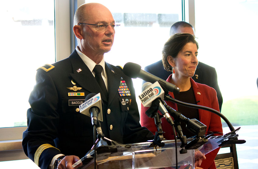 Retired Army Gen. Rick Baccus and Gov. Gina Raimondo during happier times, at the opening of the new Rhode Island Veterans Home on Veterans' Day in 2017.