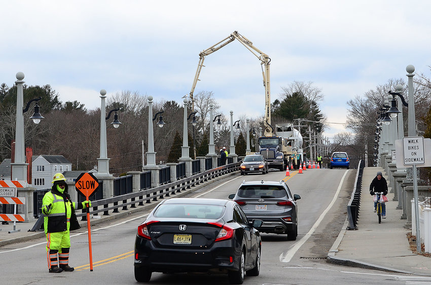 A cement truck blocks the northbound travel lane of Route 114 on Wednesday afternoon, Feb. 12, as part of the Barrington River Bridge repair project.
