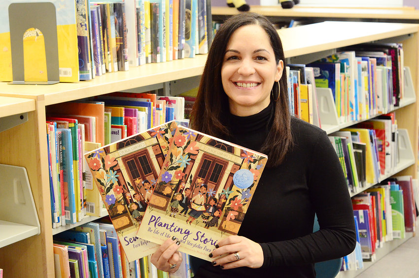 Barrington resident Anika Denise's latest book, &quot;Planting Stories: The Life of Librarian and Storyteller Pura Belpr&eacute;,&quot; won the Pura Belpr&eacute; Award.