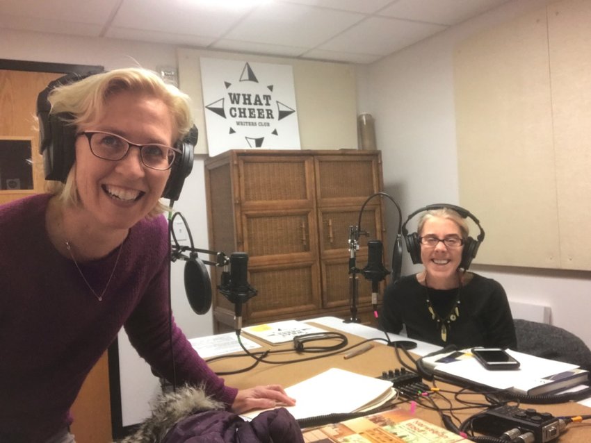Katie Hutchison, foreground, and Dawn Oliveira have collaborated on a new podcast, Design Me a House. They are pictured here in the podcast studio at the What Cheer Writers Club in Providence, in the days before social distancing mandates forced them to produce the podcast remotely from their own homes.