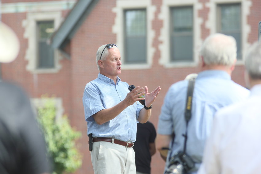 Barrington Town Manager Jim Cunha speaks to the crowd at a rally against racism held outside Barrington Town Hall on Sunday, Aug. 9.