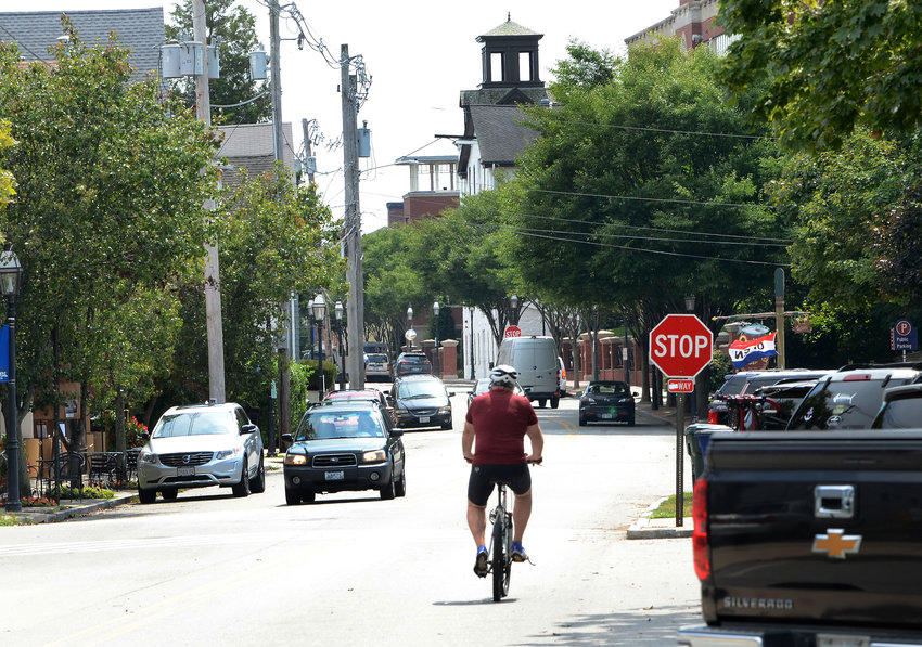 A bicyclist heads south on Thames Street in Bristol after a ride along the bike path on Tuesday. A popular route to get bikers from Independence Park to the southern end of Bristol would be to send them south along Thames, get them over to High Street, and then connect them to Ferry Road, on their way to the Roger Williams University campus.