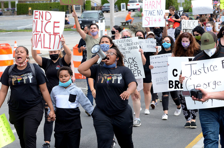 Organizers and protestors march into downtown Bristol during a Black Lives Matter rally in June.