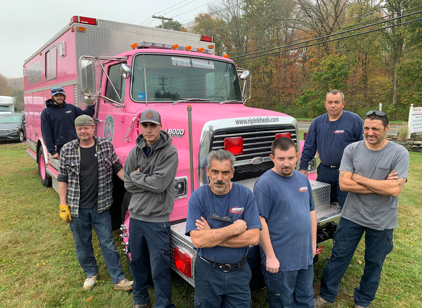 The newest Pink Heals truck was meticulously restored by the crew from Bristol Auto Body (from left to right) Joey Major, Steve Meyer, Jeff Moss, Joe Miranda, Justin Miranda, Max Galvao, and John Madeira.