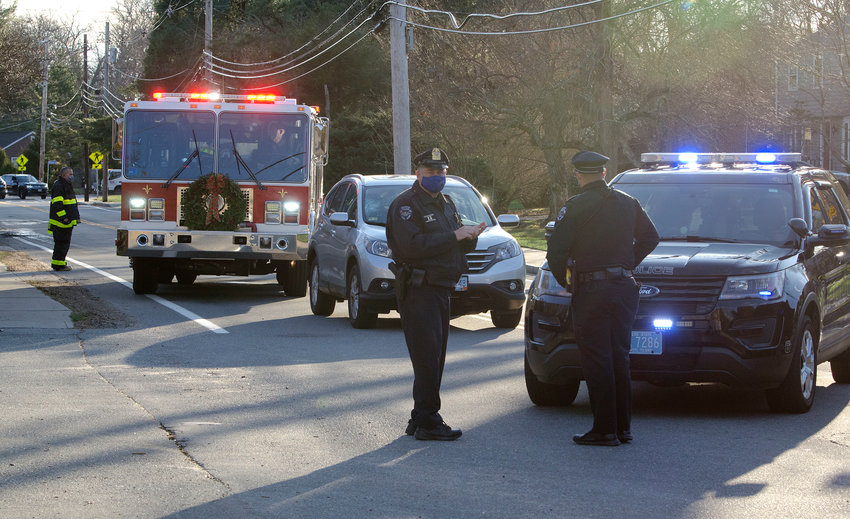 Barrington police and fire block off a section of New Meadow Road on Monday, following an accident.
