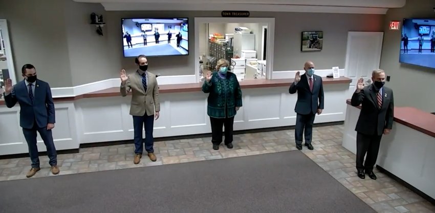The five &ldquo;new&rdquo; members of the Bristol Town Council (all incumbents), Aaron Ley, Timothy Sweeney, Mary Parella, Antonio &ldquo;Tony&rdquo; Teixeira and Nathan Calouro (from left to right), take the oath of office Monday night in a four-minute ceremony.