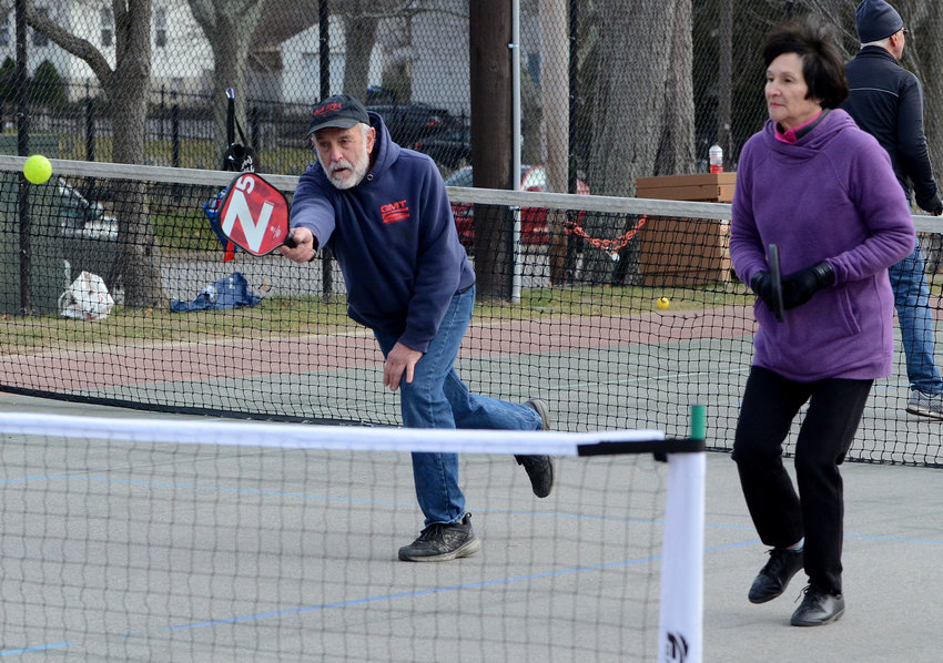 People play a game of pickle-ball in Bristol recently. Last week, the Barrington Park and Recreation Commission approved a motion to paint pickle-ball court lines on the asphalt surface at Chianese Park.
