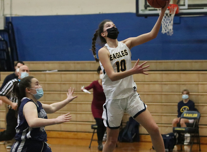 Barrington High School freshman Dani Ceseretti drives to the basket for two of her game-high 24 points in the Eagles 52-24 victory over Moses Brown last week.