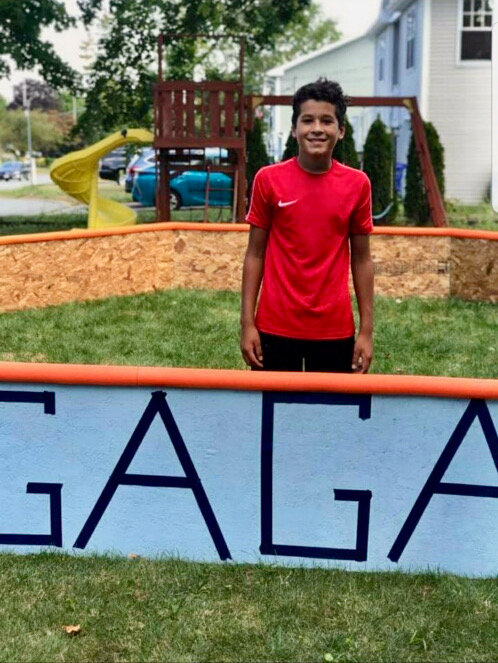 Kayleb Ruszczyk inside the GaGa ball pit he built for his yard last year. He brought his idea for a GaGa ball program to the Portsmouth Recreation Department.