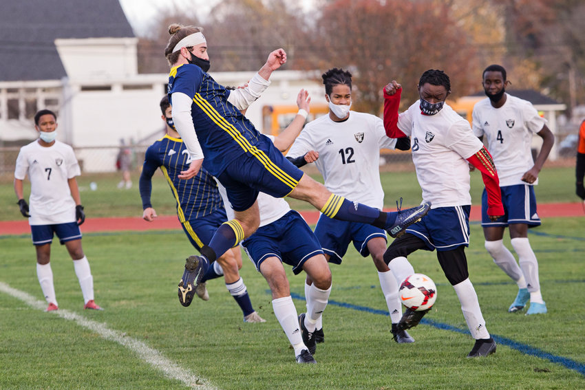 Barrington High School&rsquo;s Jackson Bennett flies through the air to connect with a shot on goal during a game this fall. Jackson was recently selected to the United Soccer Coaches Association&rsquo;s All American team.