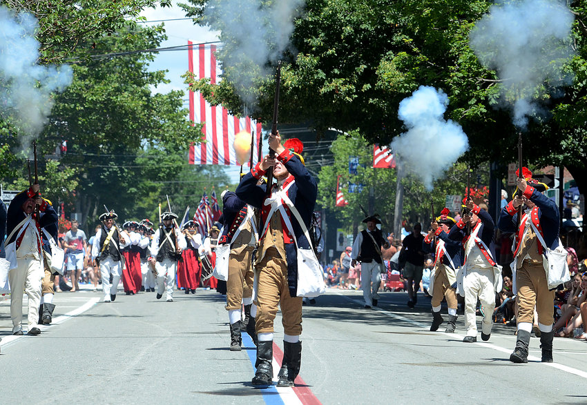 As would be expected on the new &ldquo;Revolutionary Heritage Byway,&rdquo; the Bristol Train of Artillery marches south on Hope Street during a Fourth of July parade.
