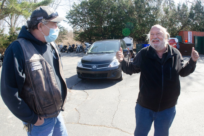 Star Riders Motorcycle Club member Kevin Hebert (left) looks on as Vietnam veteran Donald DiPierro of Barrington reacts to seeing his new car at the Bristol VFW on Saturday during a brief ceremony including veterans from the Sidewinders, Star Riders, and the U.S. Veterans Motorcycle Clubs of Bristol County, Rhode Island and New York.