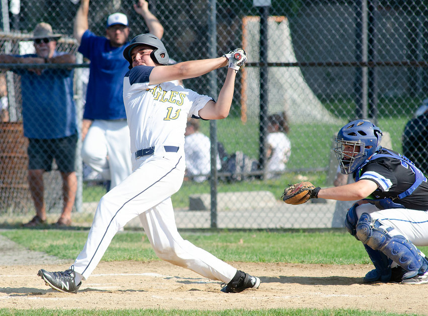 Barrington's Ned Shapiro blasts a single, scoring a run for the Eagles in the playoff game against Scituate on Tuesday.