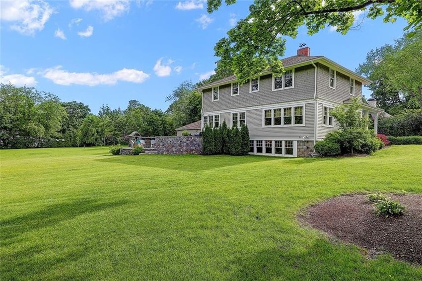 This Dutch Colonial on Woodland Road in Barrington is a perfect example of what&rsquo;s happening in the &ldquo;luxury&rdquo; homes market. A few years ago, it would be considered a really nice, upper middle class home in a great neighborhood, close to the center of town off Rumstick Road in Barrington &mdash;&nbsp;the type of home that might sell for about $700,000. In fact, it is assessed by the Town of Barrington at $695,000. With modern upgrades and beautiful renovations &mdash; and in this market &mdash; it sold this summer for $1.3 million.    Sellers were represented by the Kirk Schryver Team of Residential Properties, and the Buyers were represented by Kris Chwalk of Residential Properties.
