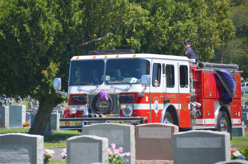 Bristol Fire Dept. Engine 5 arrives at St. Mary's Cemetery for the funeral of Ray Castro.