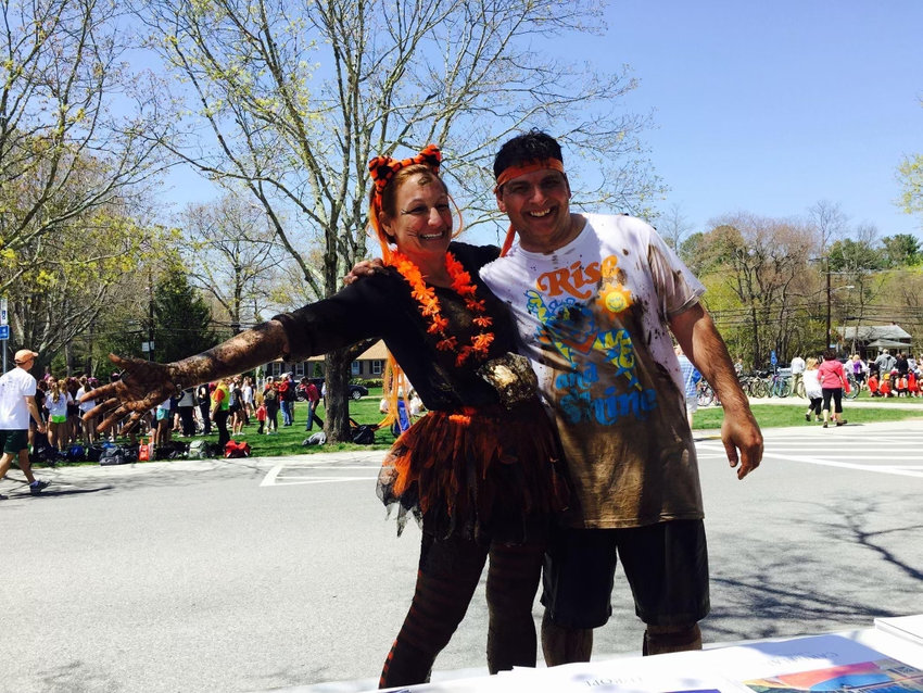 HMS Principal Tracey McGee-Moreira and Assistant Principal Gino Sangiuliano are shown posing for the camera at a Hampden Meadows School Tough Tiger Adventure Race. Mrs. McGee-Moreira announced recently that she was resigning. Mr. Sangiuliano will serve as interim principal.