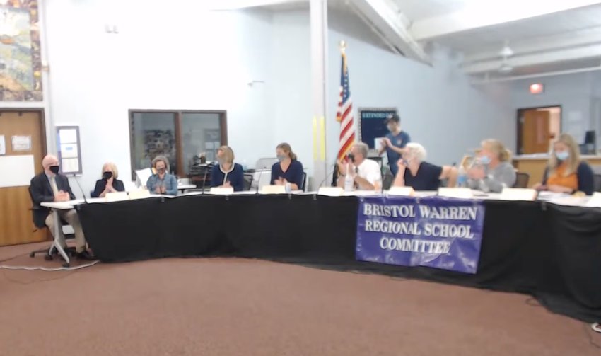 The Bristol Warren Regional School Committee gives a short round of applause after unanimously approving Ed Mara (seated at far left) as its new interim superintendent of schools Tuesday night.
