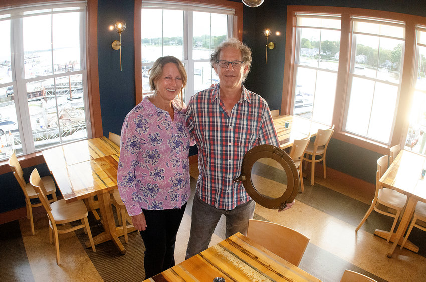 Russell Goyette, owner of Trafford Restaurant (285 Water Street), and his fianc&egrave;e, Sherri Miles, inside the newly-renovated restaurant overlooking the river.