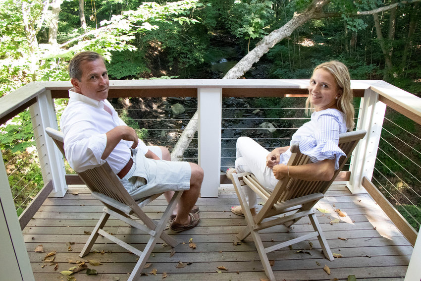 Jonathan and Erin Chapman relax on the small deck on the north side of their home, overlooking Mint Water Brook. &ldquo;It&rsquo;s funny,&rdquo; Erin said. &ldquo;Jonathan&rsquo;s parents&rsquo; house is on a rushing river and my parents are on a brook, so I think for both of us, that was always a part of what we grew up with.&rdquo;