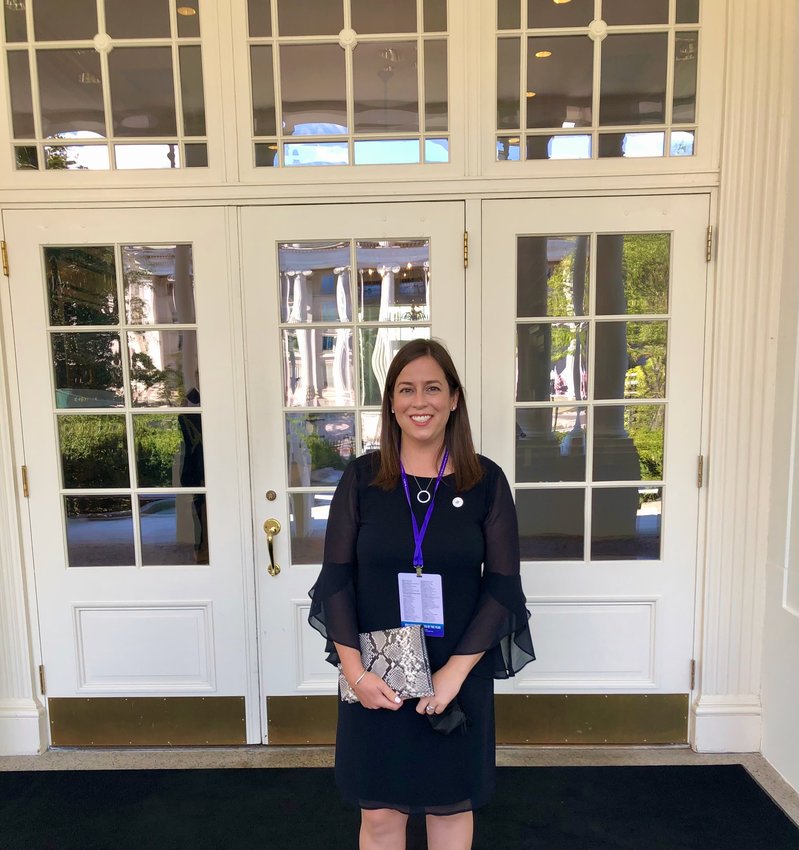 Hathaway School third-grade teacher Ashley Adamson, the 2021 R.I. Teacher of the Year, stands in front of the entrance to the White House during her trip to Washington, D.C. last month.