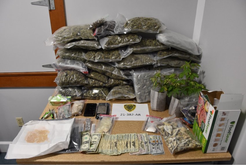 Police found a large amount of marijuana, cocaine and other illicit drugs, in addition to loose cash, following response to a fire call on Kickemuit Road on Thursday, Dec. 2.