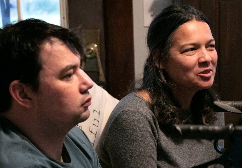 Serena Moseman-Valtierra sits next to her husband Robert, discussing the fire that tore through their Alfred Drown Road home on Dec. 4. The Valtierras said their neighbors have been very supportive during the aftermath, providing food, clothing and housing.