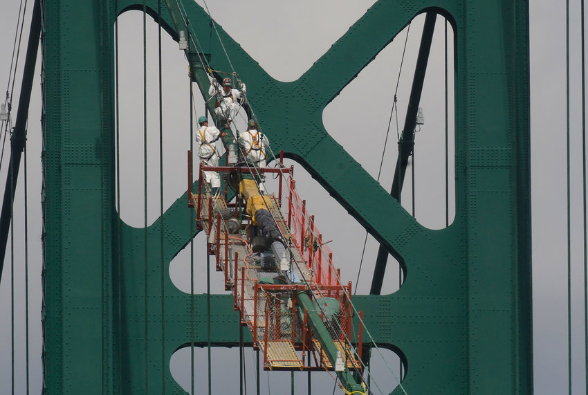 A crew performs work on the Mt. Hope Bridge during a previous maintenance project. The bridge was built in 1929.