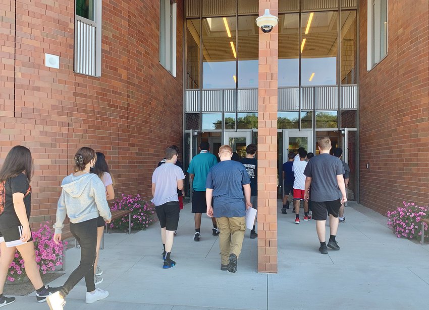 Students file into the Westport Middle High School on the first day of classes in the building this September.