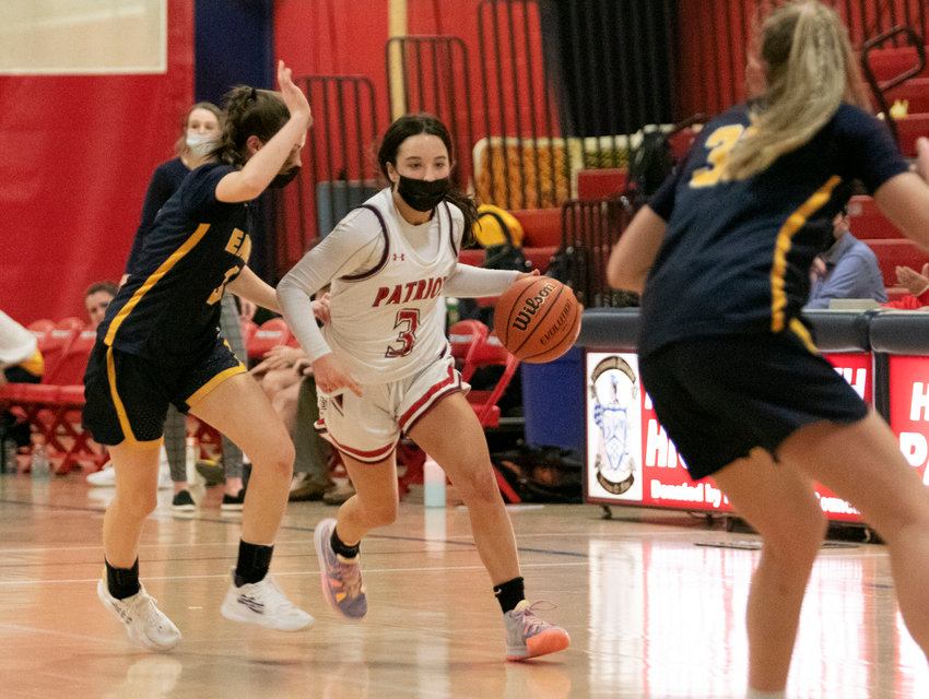 Portsmouth High&rsquo;s Olivia Durant dribbles up court amidst a Barrington press during Monday night&rsquo;s Division I home game.